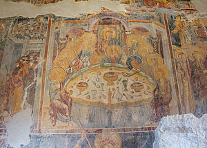 Eine über 500 Jahre alte Wandmalerei zeigt das Motiv des letzten Abendmahls.