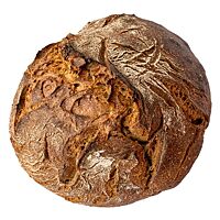 Das runde Weizenmischbrot ist kräftig ausgebacken und rustikal aufgerissen.